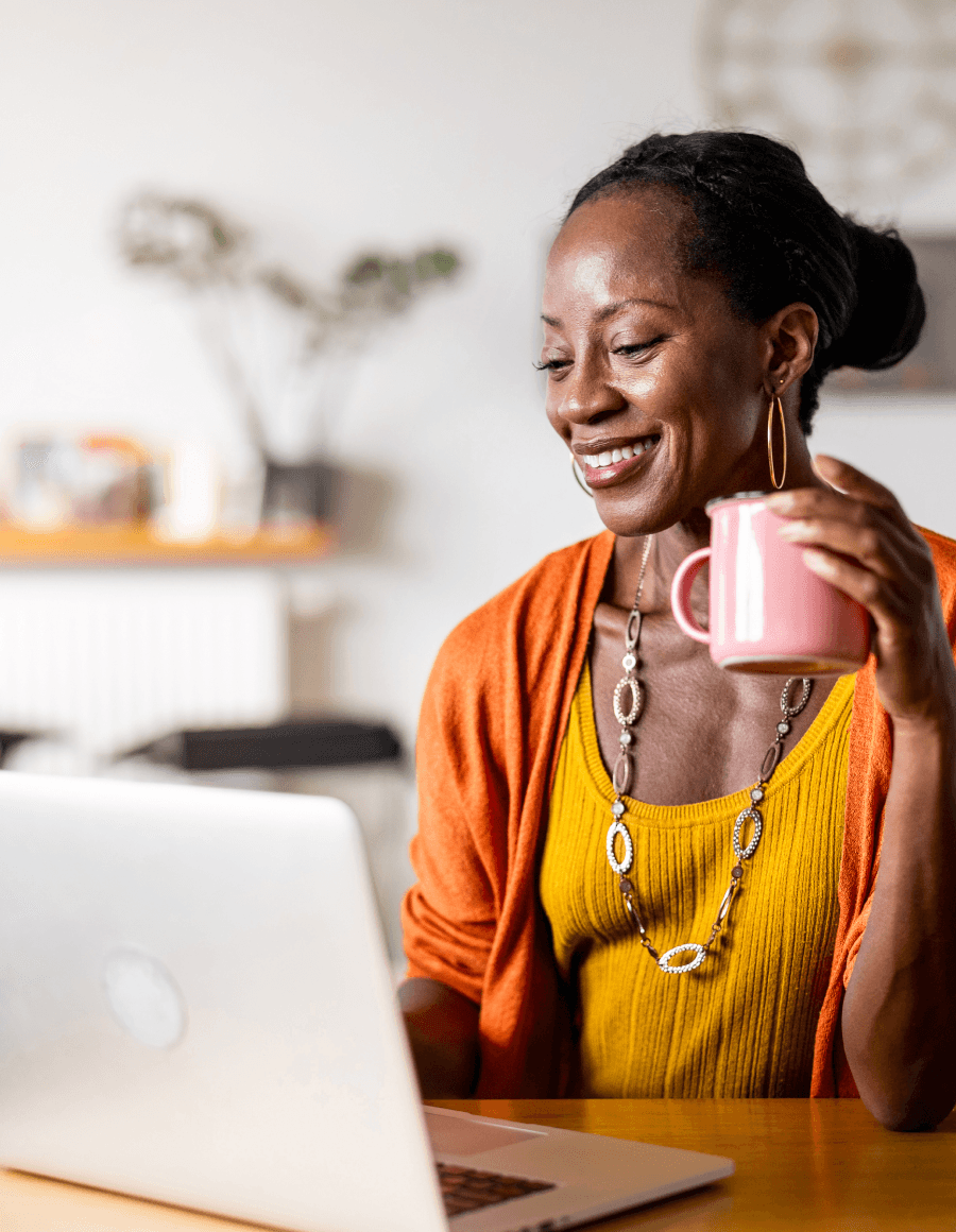 Smiling woman with laptop